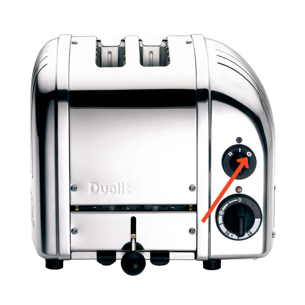 Dualit-brand toaster, with orange arrow pointing at dial icon of a bagel