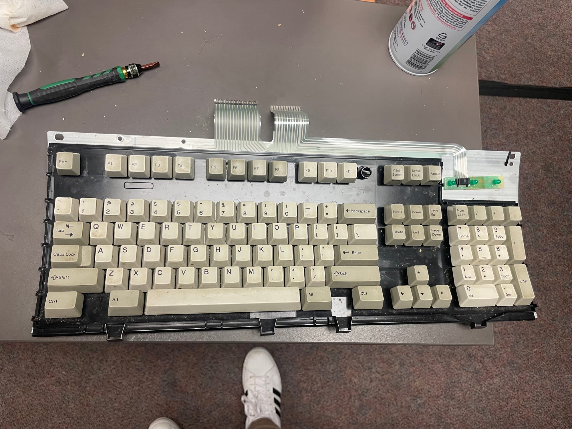 keyboard, disassembled with yellowed keys