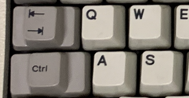 Ctrl visible, below tab, with raised portions the size of a normal key